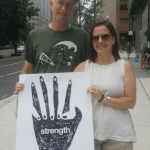 people-holding-posters-in-crowd